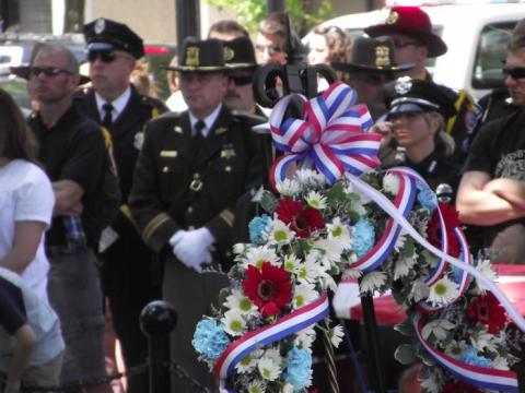 Wreath presented to the families of fallen officers at the memorial site