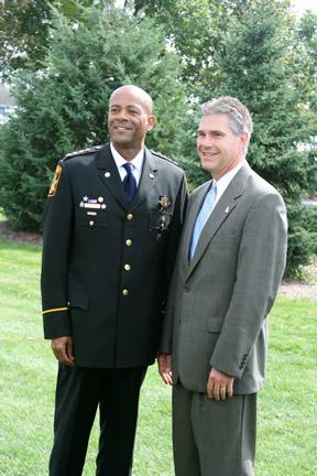 Attorney General J.B. Van Hollen poses for a picture with Milwaukee County Sheriff David Clarke Jr. before the National Day of Remembrance for Murder Victims Ceremony 2010 in Watertown, Wisconsin.